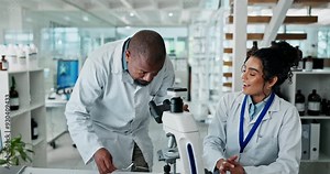 Teamwork, scientist and microscope for research, medical and healthcare with dna in laboratory. Computer, specialist people and genome editing for Alzheimer, clinic trail and biotech teamwork