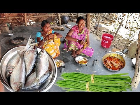 santali tribe traditional cooking RIVER FISH curry with drumsticks prepare by santali tribe women