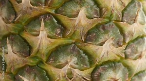 Pineapple exotic fruit texture close-up 4K 2160p 30fps UltraHD tilting footage - Tropical Ananas comosus structure slow tilt 4K 3840X2160 UHD video