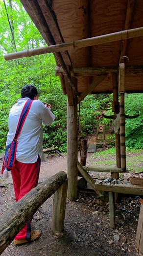 Our tour guide demonstrated the blow darts that the Cherokee Indians used while hunting. #ncmemorymakers #cherokeeindianvillage #cherokee #cherokeeindian | NCMemoryMakers