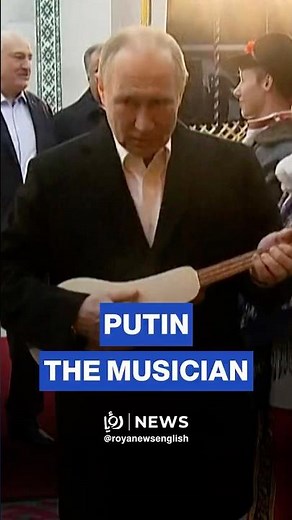 Putin tests his musical skills on a traditional instrument in Kyrgyzstan