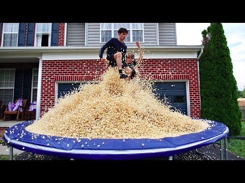 5 MILLION PIECES OF POPCORN ON TRAMPOLINE!