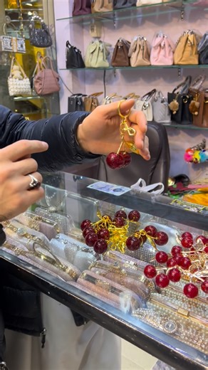 Gulzari collection 👜 on Instagram: "Cherry 🍒 Wala keychain available asta da gulzari_shoes_and_bags_ tshkur ."