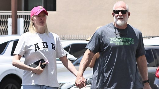 Erika Jayne steps out with John 'Shrek' McPhee, a decorated US Army veteran. The 'RHOBH' star is still legally married to Tom Girardi. | Entertainment Tonight