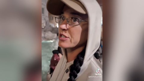 Katy Perry puts bank card in Rome's Trevi Fountain for good luck