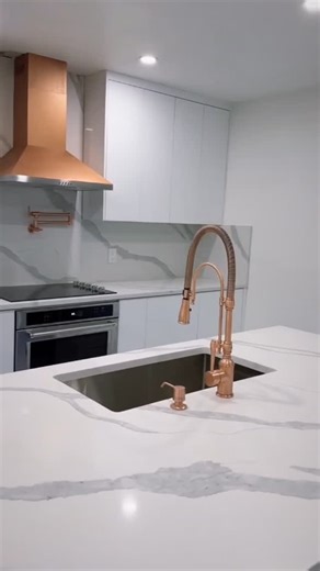 Stoneworks Unlimited INC on Instagram: "Elegant, timeless, and effortlessly practical — this stunning kitchen features quartz countertops designed to look just like marble. 💎✨ The soft gray veining gives that luxurious Calacatta vibe, without the upkeep or worry about stains. Perfect for bright white cabinetry and a bold blue island centerpiece — pure Miami charm. 🌴🤍💙 #MiamiDesign #KitchenGoals #QuartzCountertops #MiamiKitchens #KitchenDesignInspo #WhiteAndBlueKitchen #InteriorDesignMiami #L