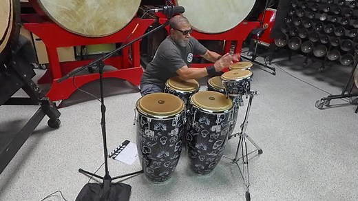 The long-awaited Lenny Castro Signature Series Congas and Bongos are here! Featuring Asian Oak shells, they come with teardrop top rings, for ease of extended playing time. Each head is hand-selected from natural rawhide, providing a warm, rich tone and features Lenny’s hand-drawn skull logo. Gon Bops Lenny Castro Series drums boast eye-popping, exciting original artwork, highlighting Lenny’s identifiable sunglasses, skull and conga sketches. A true reflection of this master percussionist, at an