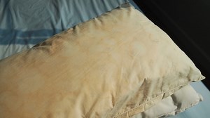 The Reason Your Pillows Turn Yellow, and How to Clean Them