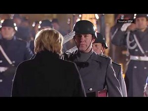 Outgoing German Chancellor Angela Merkel receives farewell military honours at ‘Grand Tattoo’