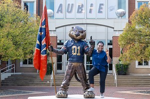 We all know Aubie the Tiger, but have you met Aubie the grad student and Fulbright Scholar? From Togo to becoming a tiger, her story shows that all roads lead to Auburn 🧡💙 #WarEagle https://bit.ly/4evARqe | Auburn University