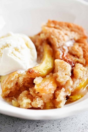 5.8K views · 52 reactions | This Bisquick Peach Cobbler recipe is so easy to make with Bisquick and fresh peaches! Serve while warm, topped with vanilla ice cream. #peachcobbler #bisquick #bisquickrecipes #dessert #thegunnysack #peaches #summer #cobbler | The Gunny Sack | Facebook