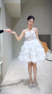 1.6K views · 41 reactions | 誰說禮服一定要拖著長長裙擺？勺 短版禮服，就是穿上去就微笑的那種 可以轉圈、可以跳舞、可以擁抱， 所有快樂瞬間都被保留得更自由。 因為每個開心的小動作， 短版禮服都替你演繹得更加可愛 #VIVIBRIDE #短版禮服 #拍照禮服 #宴客禮服 #命定婚紗 | VIVI Bride 薇薇新娘 | Facebook