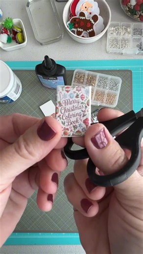 Amanda Jane | Craftee on Instagram: "🎄Christmas Mini Book Charms ✨ Minis are so cute and especially Christmas mini books! I’m sharing all the details in my latest YT 🎥 #christmascrafting #papercrafting #diycharms #minibooks #christmasbooks"
