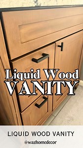 EASY Bathroom Vanity UPGRADE with NO SANDING & Liquid Wood!! 🤯 Comment LINK for all the products & STEPS. Follow for more budget friendly DIYs!! I used Retique It Light Wood Color Liquid Wood and Varathane Kona Stain (oil based) for this transformation!! Steps below ⬇️ - Clean all surfaces to be covered with liquid wood. No sanding needed. Remove drawers and cabinets as well as hardware. Tape off walls and floors. - Apply liquid wood to all surfaces with a foam brush in long even strokes. I use