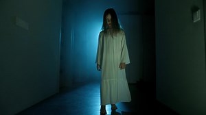clip-1079014229-ghost-girl-white-nightgown-loose-hair-scary