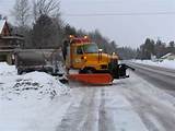 Images of Pickup Trucks Plowing Snow