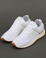 Pictures of New Balance White Trainers