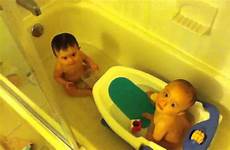 bath twin babies time