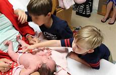 babies brothers twin boys curious her while cord umbilical birthday womb talked interested eat times many had were very