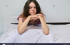teenager bed alamy sad stock sitting girl