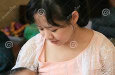 mother asian baby her feeding preview