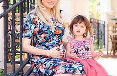 holly madison rainbow pregnant daughter baby bump shoot her dress floral bloom shows off blossoming posed angeles thursday los