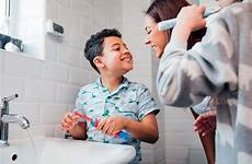 brush kids properly tips teaching toothbrushes electric teeth standard vs their brushing mouth children bathroom sure