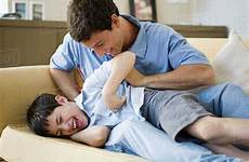 tickling father son stock young dissolve d984