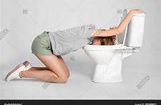 vomiting woman toilet stock young