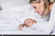 mother sleeping baby stock attractive allaserebrina depositphotos