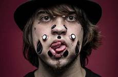 flesh holes face man tunnels his weird guinness records record people through most express disturbing teeth