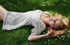 wallpaper lying girl back blonde dress nature eyes blue down grass legs wallls looking flowers