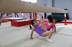 sports school china training gymnastics girl olympic schools inside leg stretches tennis beijing shichahai students line table their after beam