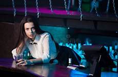 bartender nightclub bar girl brunette working stock