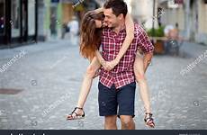 piggyback ride girlfriend giving young man his shutterstock stock search