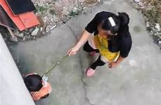 chinese wetting whips stepmother kicks whipping child