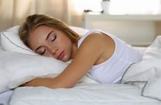 bed woman blonde sleeping young lying beautiful portrait stock