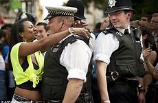 carnival notting hill violence teenager stab suffers wounds serious dancer policeman hugs