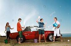car washing young fight having water people hose stock alamy