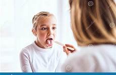 doctor office female young her girl small examining