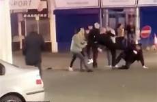 man kicked unconscious vicious shocking moment fight centre town ground while during stumbling seen middle floor fall road around before