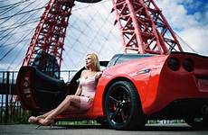 women corvette car cars blonde red wallpaper model chevrolet portrait outdoors sunglasses depth distance sitting heels necklace legs field looking
