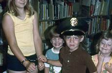 handcuffs girl library young children denton fowler emily stands portal primary small