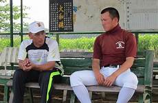 father shota son glory pitch baseball wsj yamato koryo discuss strategy practice field side his