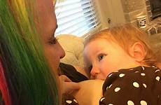 lacey breastfeeding breastfeeds stares lovingly vega
