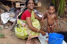 bathing india mother child baby culture people slum poverty jungle wallpaper countries temple public domain