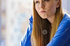 sill depressed sad sitting window teen girl woman preview