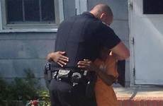 cop officer hug
