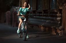 cycling women city jean wallpaper bicycle model 500px filippov roman smiling shorts vehicle screenshot sports wallhere