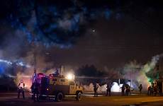 reverses restrictions clashes protesters armored whitney ferguson curtis